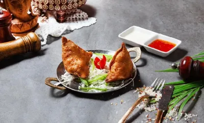 Kitchen of India — signature dish: Samosa